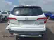 2020 Honda Pilot Elite with VIN 5FNYF6H05LB053582, listed as a IAAI auction lot 41721168 with 56,770 mi miles and . Bid and sale history available at DreamBid. Image 16.