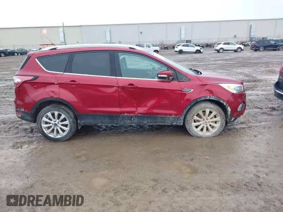 2017 Ford Escape Titanium с VIN 1FMCU9JD9HUC09244, выставлен на аукционе IAAI как лот 41213880 с пробегом 117 338 миль миль и . История ставок и продаж доступна на DreamBid. Изображение 13.