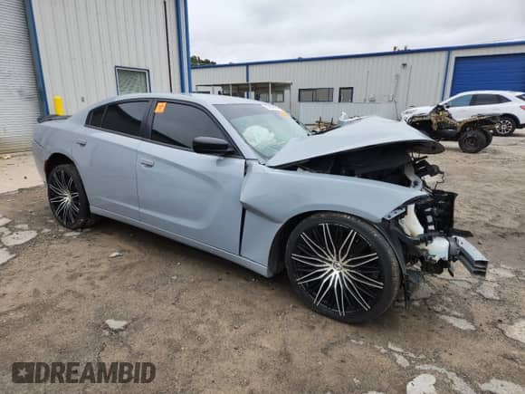 2021 Dodge Charger SXT z VIN 2C3CDXBG9MH532597, wystawiony jako Copart lot #85954445 z przebiegiem Nie podano mil oraz Czysty tytuł • Clean title. Historia ofert i sprzedaży dostępna na DreamBid. Obrazek 4.