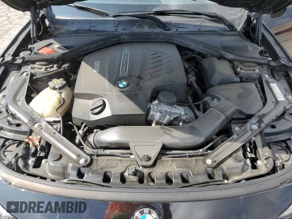 2015 BMW 4 Series 435i z VIN WBA3T3C51FP939703, wystawiony jako Copart lot #64424055 z przebiegiem 100 345 mil mil oraz Szkoda całkowita • Salvage title. Historia ofert i sprzedaży dostępna na DreamBid. Obrazek 11.