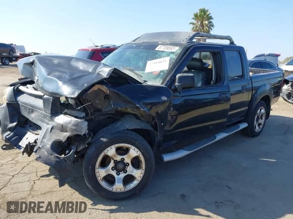 2001 Nissan Frontier with VIN 1N6MD27T41C389353, listed as a IAAI auction lot 37914035 with 89,895 mi miles and . Bid and sale history available at DreamBid. Image 2.