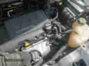 2018 Chevrolet Sonic Premier z VIN 1G1JF5SB3J4138309, wystawiony jako Copart lot #68265475 z przebiegiem 99 578 mil mil oraz Szkoda całkowita • Salvage title. Historia ofert i sprzedaży dostępna na DreamBid. Obrazek 13.