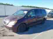 2010 Honda Odyssey LX with VIN 5FNRL3H25AB079528, listed as a IAAI auction lot 43390658 with 242,152 mi miles and . Bid and sale history available at DreamBid. Image 2.