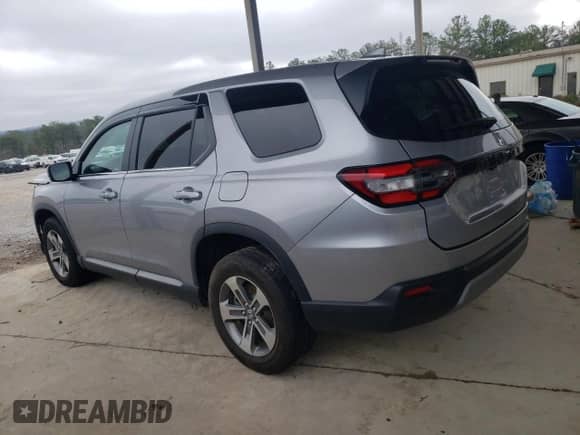 2023 Honda Pilot EX-L z VIN 5FNYG2H55PB006396, wystawiony jako Copart lot #86499074 z przebiegiem Nie podano mil oraz Szkoda całkowita • Salvage title. Historia ofert i sprzedaży dostępna na DreamBid. Obrazek 2.