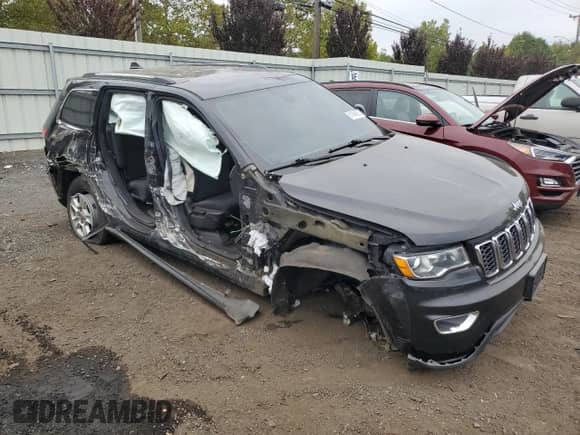 2017 Jeep Grand Cherokee 75th Anniversary with VIN 1C4RJFAG9HC640785, listed as a Copart auction lot 81494635 with 167,891 mi miles and Salvage title. Bid and sale history available at DreamBid. Image 4.