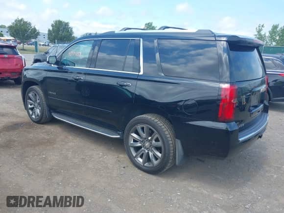 2018 Chevrolet Tahoe Premier with VIN 1GNSKCKC8JR104865, listed as a IAAI auction lot 42771057 with 123,387 mi miles and . Bid and sale history available at DreamBid. Image 3.