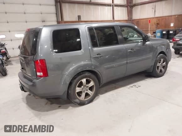 2013 Honda Pilot EX-L with VIN 5FNYF4H55DB033673, listed as a IAAI auction lot 43454478 with 215,014 mi miles and . Bid and sale history available at DreamBid. Image 4.