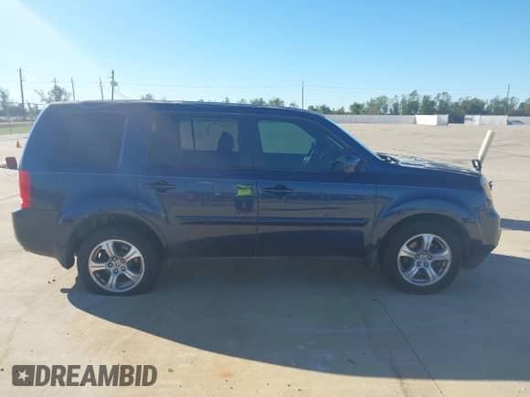 2014 Honda Pilot EX-L with VIN 5FNYF3H5XEB018131, listed as a IAAI auction lot 43577493 with 194,281 mi miles and . Bid and sale history available at DreamBid. Image 13.