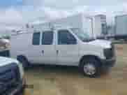 2013 Ford Econoline Cargo Commercial with VIN 1FTNE1EW7DDB01352, listed as a IAAI auction lot 42908765 with 102,950 mi miles and . Bid and sale history available at DreamBid. Image 13.