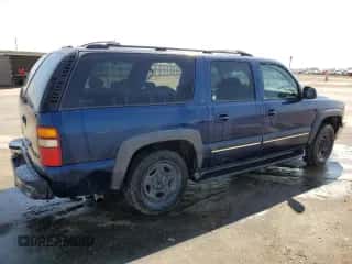 2001 Chevrolet Suburban LS с VIN 3GNEC16T51G222493, выставлен на аукционе Copart как лот 64689834 с пробегом Не указан миль и Списание • Salvage title. История ставок и продаж доступна на DreamBid. Изображение 3.