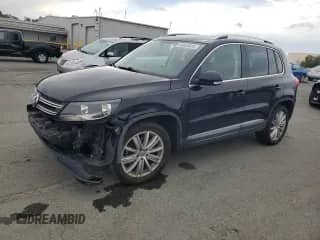 2012 Volkswagen Tiguan S с VIN WVGAV7AX7CW603020, выставлен на аукционе Copart как лот 84948825 с пробегом 90 151 миль миль и Списание • Salvage title. История ставок и продаж доступна на DreamBid. Изображение 1.