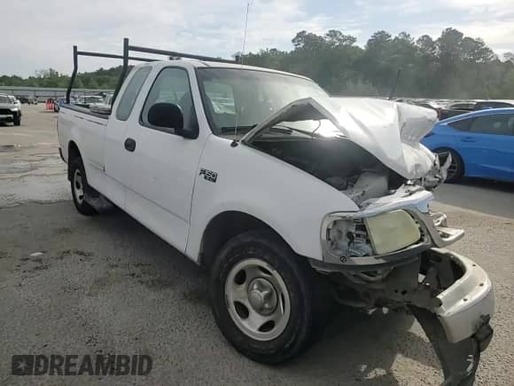 2004 Ford F-150 XL с VIN 2FTRX17294CA68652, выставлен на аукционе Copart как лот 53442525 с пробегом Не указан миль и Списание • Salvage title. История ставок и продаж доступна на DreamBid. Изображение 13.