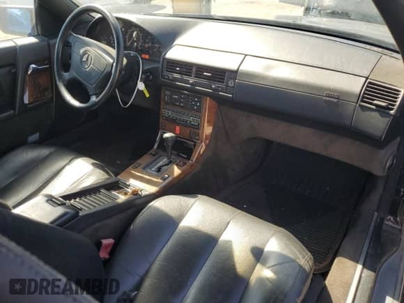 1992 Mercedes-Benz SL с VIN WDBFA66E1NF058408, выставлен на аукционе Copart как лот 75694294 с пробегом 169 308 миль миль и Чистый • Clean title. История ставок и продаж доступна на DreamBid. Изображение 8.