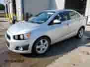 2016 Chevrolet Sonic LTZ with VIN 1G1JE5SB2G4137986, listed as a Copart auction lot 68088785 with 98,566 mi miles and Salvage title. Bid and sale history available at DreamBid. Image 1.