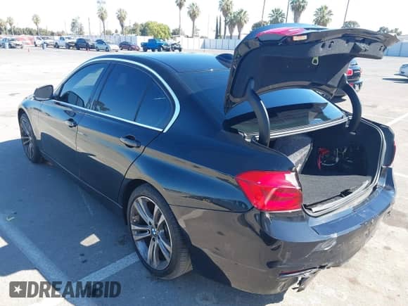 2018 BMW 3 Series 330i with VIN WBA8B9G58JNV00606, listed as a IAAI auction lot 43239190 with 68,085 mi miles and . Bid and sale history available at DreamBid. Image 3.
