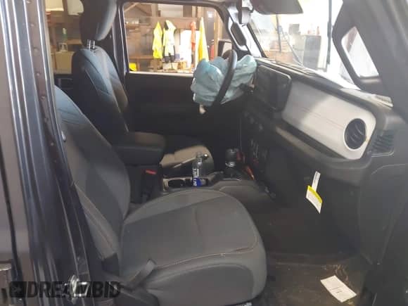 2024 Jeep Wrangler Sport S with VIN 1C4RJXN67RW310263, listed as a IAAI auction lot 42810399 with 6,804 mi miles and . Bid and sale history available at DreamBid. Image 5.