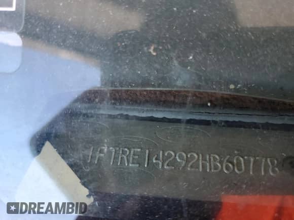 2002 Ford Econoline Cargo with VIN 1FTRE14292HB60778, listed as a Copart auction lot 74345234 with 173,366 mi miles and Salvage title. Bid and sale history available at DreamBid. Image 13.