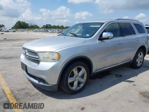 2013 Dodge Durango Citadel with VIN 1C4RDHEG0DC571833, listed as a IAAI auction lot 42736033 with 110,808 mi miles and . Bid and sale history available at DreamBid. Image 2.