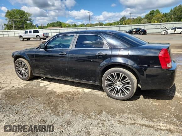 2010 Chrysler 300 S with VIN 2C3CA2CV5AH330974, listed as a Copart auction lot 83865605 with 295,696 mi miles and Salvage title. Bid and sale history available at DreamBid. Image 2.