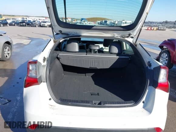 2021 Toyota Prius LE with VIN JTDL9MFU8M3029027, listed as a IAAI auction lot 43354130 with 66,497 mi miles and . Bid and sale history available at DreamBid. Image 17.