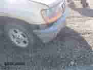 2000 Jeep Grand Cherokee Laredo z VIN 1J4GW48S0YC309210, wystawiony jako IAAI lot #43551821 z przebiegiem 324 070 mil mil oraz . Historia ofert i sprzedaży dostępna na DreamBid. Obrazek 6.