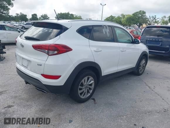 2016 Hyundai Tucson Sport with VIN KM8J33A22GU081868, listed as a IAAI auction lot 41924692 with 123,360 mi miles and . Bid and sale history available at DreamBid. Image 4.