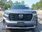 2024 Honda Pilot Touring with VIN 5FNYG1H74RB021101, listed as a IAAI auction lot 42857901 with 20,597 mi miles and . Bid and sale history available at DreamBid. Image 12.