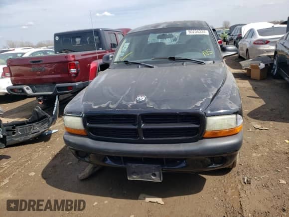 2002 Dodge Dakota Sport z VIN 1B7HL38N62S569437, wystawiony jako Copart lot #50204334 z przebiegiem Nie podano mil oraz Czysty tytuł • Clean title. Historia ofert i sprzedaży dostępna na DreamBid. Obrazek 5.