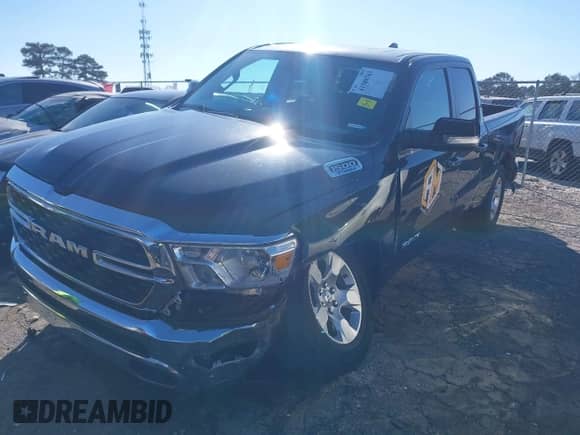 2022 Ram 1500 Big Horn z VIN 1C6RREBG0NN398834, wystawiony jako IAAI lot #41580763 z przebiegiem 100 523 mil mil oraz . Historia ofert i sprzedaży dostępna na DreamBid. Obrazek 17.