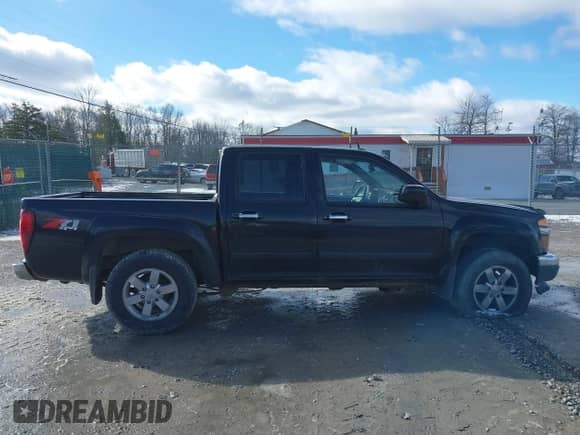 2012 Chevrolet Colorado 2LT z VIN 1GCHTDFE5C8100654, wystawiony jako IAAI lot #41213103 z przebiegiem 230 065 mil mil oraz . Historia ofert i sprzedaży dostępna na DreamBid. Obrazek 13.