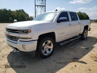 2017 Chevrolet Silverado 1500 LTZ with VIN 3GCUKSEC8HG233447, listed as a Copart auction lot 71398365 with 146,849 mi miles and Salvage title. Bid and sale history available at DreamBid. Image 1.