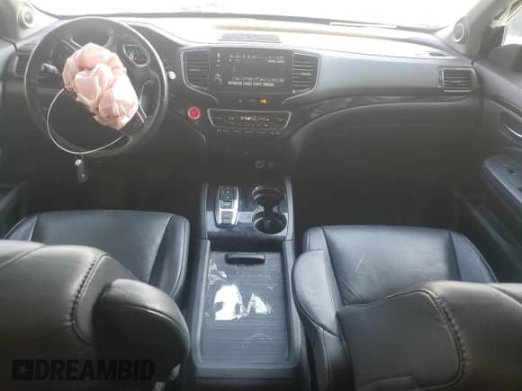 2020 Honda Pilot Touring 7-Passenger z VIN 5FNYF5H63LB011474, wystawiony jako Copart lot #62547135 z przebiegiem 100 676 mil mil oraz Szkoda całkowita • Salvage title. Historia ofert i sprzedaży dostępna na DreamBid. Obrazek 8.