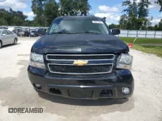 2014 Chevrolet Suburban LT with VIN 1GNSCJE01ER122858, listed as a Copart auction lot 86877895 with 181,574 mi miles and Salvage title. Bid and sale history available at DreamBid. Image 5.