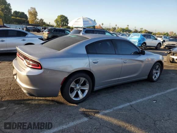 2016 Dodge Charger SXT с VIN 2C3CDXHGXGH285599, выставлен на аукционе Copart как лот 82747605 с пробегом 167 421 миль миль и Списание • Salvage title. История ставок и продаж доступна на DreamBid. Изображение 3.