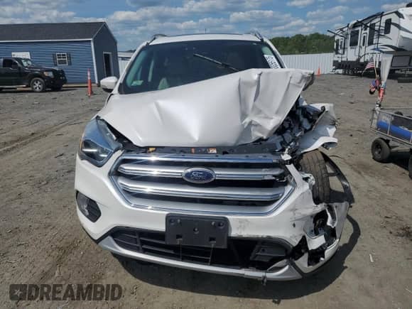 2017 Ford Escape Titanium с VIN 1FMCU9J90HUD33222, выставлен на аукционе Copart как лот 58355175 с пробегом Не указан миль и Списание • Salvage title. История ставок и продаж доступна на DreamBid. Изображение 5.