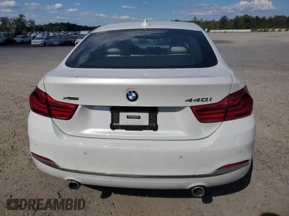 2019 BMW 4 Series 440i xDrive with VIN WBA4J7C57KBM76412, listed as a Copart auction lot 80359845 with 68,934 mi miles and Salvage title. Bid and sale history available at DreamBid. Image 6.