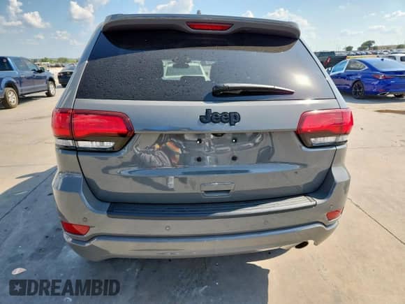 2021 Jeep Grand Cherokee Laredo E with VIN 1C4RJEAG0MC784911, listed as a Copart auction lot 69454845 with 32,334 mi miles and Salvage title. Bid and sale history available at DreamBid. Image 6.