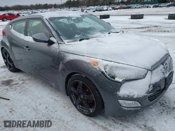 2012 Hyundai Veloster w/Gray Int z VIN KMHTC6AD5CU030807, wystawiony jako IAAI lot #41384254 z przebiegiem Nie podano mil oraz . Historia ofert i sprzedaży dostępna na DreamBid. Obrazek 1.