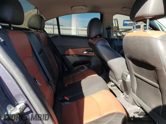 2013 Chevrolet Cruze LTZ z VIN 1G1PG5SB2D7241781, wystawiony jako Copart lot #84878285 z przebiegiem 138 387 mil mil oraz Szkoda całkowita • Salvage title. Historia ofert i sprzedaży dostępna na DreamBid. Obrazek 10.