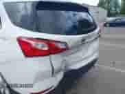 2021 Chevrolet Equinox LT z VIN 3GNAXUEV9MS127878, wystawiony jako IAAI lot #43163505 z przebiegiem 70 478 mil mil oraz . Historia ofert i sprzedaży dostępna na DreamBid. Obrazek 6.