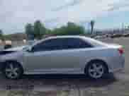 2014 Toyota Camry SE with VIN 4T1BF1FKXEU447288, listed as a IAAI auction lot 43034626 with 233,747 mi miles and . Bid and sale history available at DreamBid. Image 14.