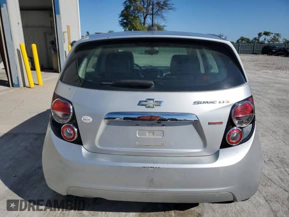 2016 Chevrolet Sonic LTZ with VIN 1G1JE6SB7G4142834, listed as a Copart auction lot 84236175 with 151,829 mi miles and Clean title. Bid and sale history available at DreamBid. Image 6.