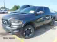 2019 Ram 1500 Rebel z VIN 1C6SRFLT4KN698648, wystawiony jako IAAI lot #42506713 z przebiegiem 143 425 mil mil oraz . Historia ofert i sprzedaży dostępna na DreamBid. Obrazek 17.