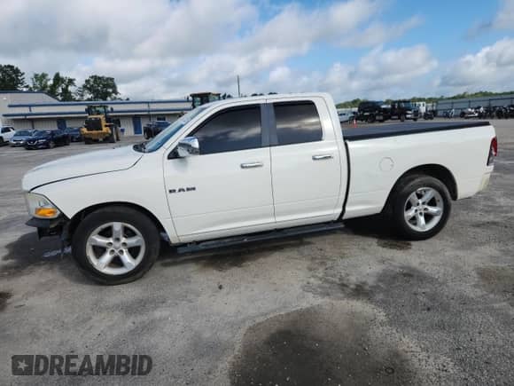 2009 Dodge 1500 SLT with VIN 1D3HB18P89S815088, listed as a Copart auction lot 64679325 with 288,035 mi miles and Salvage title. Bid and sale history available at DreamBid. Image 1.