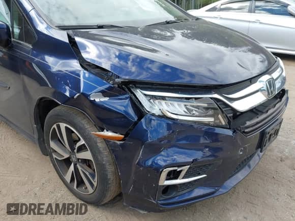 2018 Honda Odyssey Elite with VIN 5FNRL6H92JB030933, listed as a IAAI auction lot 43397917 with 74,671 mi miles and . Bid and sale history available at DreamBid. Image 6.