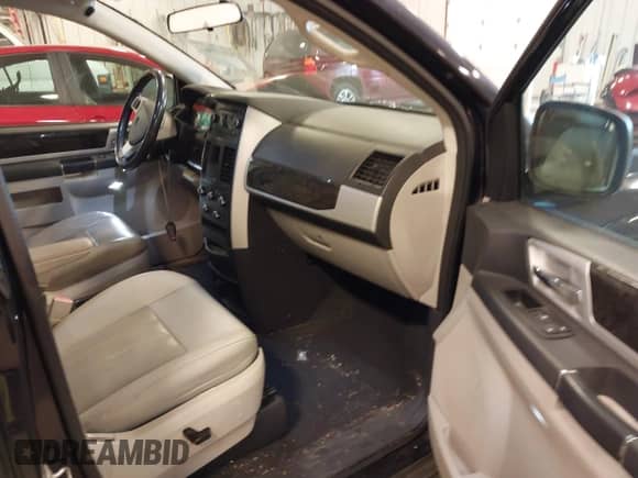 2010 Dodge Grand Caravan SXT with VIN 2D4RN5DXXAR252457, listed as a IAAI auction lot 43175672 with 103,944 mi miles and . Bid and sale history available at DreamBid. Image 5.