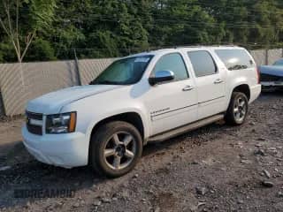 2013 Chevrolet Suburban LTZ с VIN 1GNSKKE72DR214436, выставлен на аукционе Copart как лот 67010795 с пробегом 270 274 миль миль и Списание • Salvage title. История ставок и продаж доступна на DreamBid. Изображение 1.