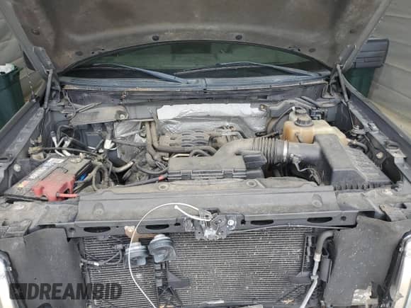 2011 Ford F-150 XL с VIN 1FTFW1EF7BFB58721, выставлен на аукционе Copart как лот 69395465 с пробегом 144 922 миль миль и Списание • Salvage title. История ставок и продаж доступна на DreamBid. Изображение 11.