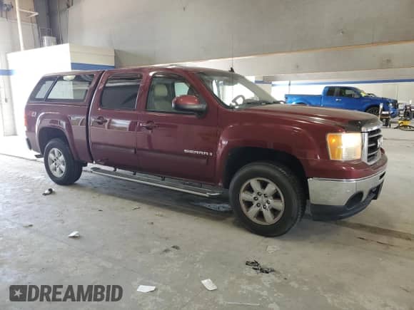 2009 GMC Sierra 1500 SLT with VIN 3GTEK33M79G226285, listed as a Copart auction lot 61543255 with 140,788 mi miles and Salvage title. Bid and sale history available at DreamBid. Image 4.