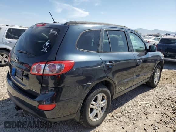 2012 Hyundai Santa Fe GLS с VIN 5XYZGDAG7CG159196, выставлен на аукционе Copart как лот 62747305 с пробегом 175 156 миль миль и Списание • Salvage title. История ставок и продаж доступна на DreamBid. Изображение 3.